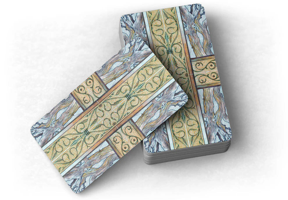 Decorative tarot card backs with intricate patterns on a white background